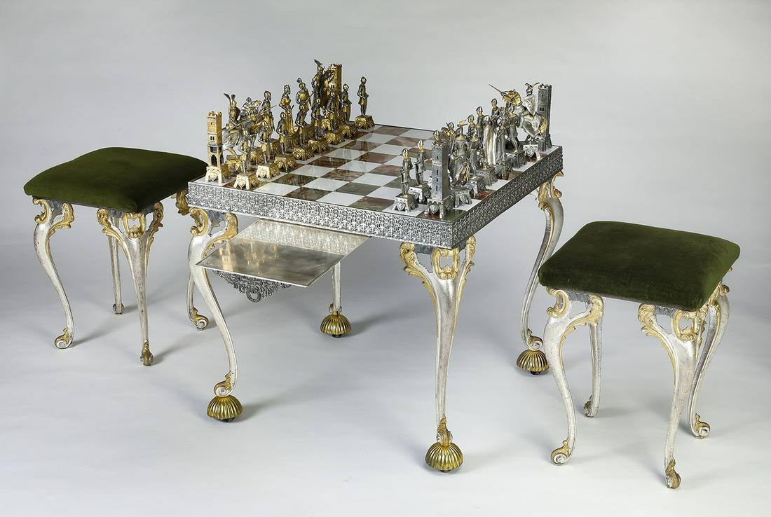 Piero Benzoni signed 24kt gold plated chess set: Piero Benzoni signed Italian chess set, including 24kt gold-plated bronze game pieces in the theme of the medieval Venetian period, ranging from 5"h to 6.75"h, presented with an onyx and marble table,
