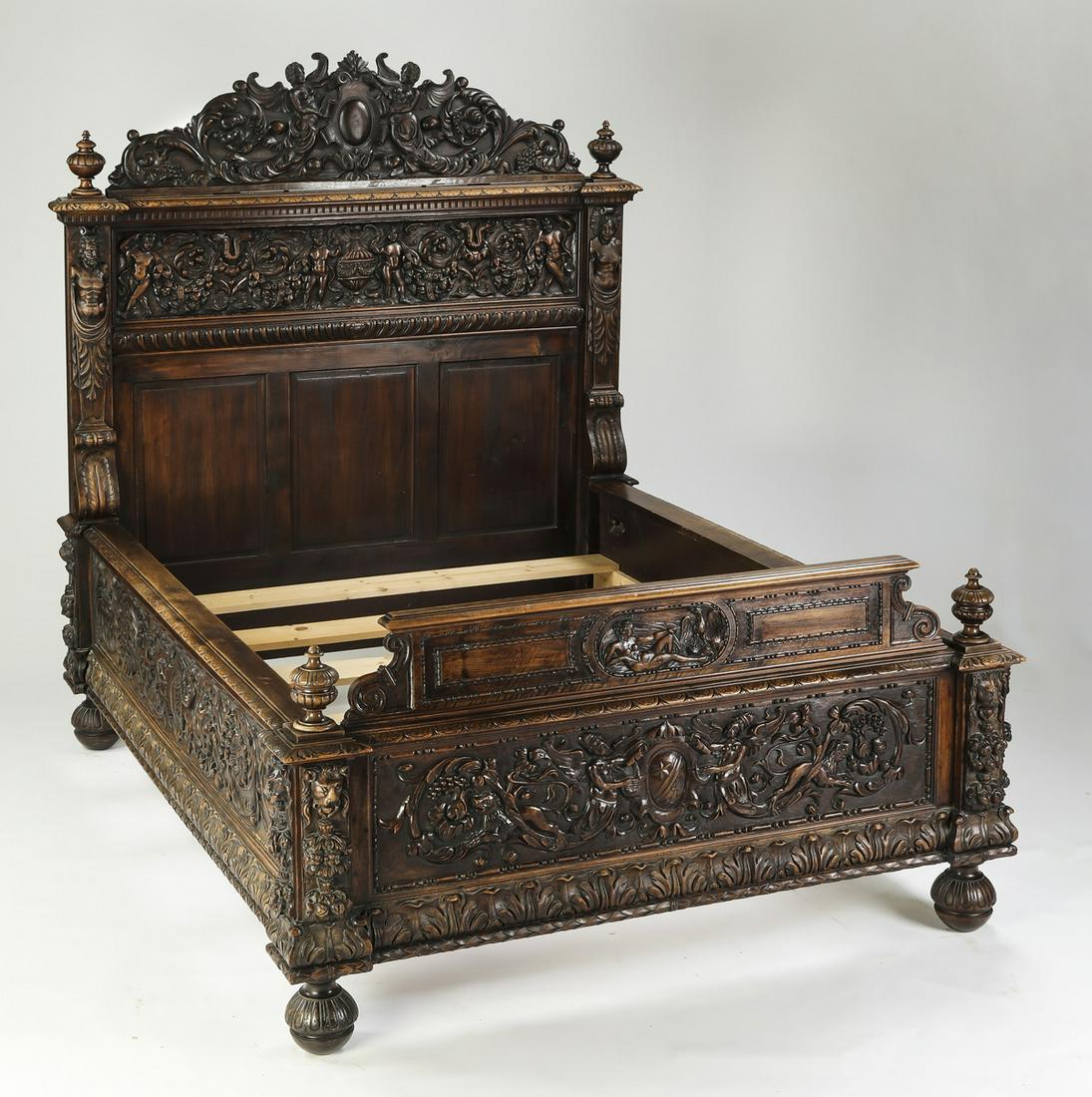 19th c. Italian Renaissance Revival carved walnut bed: Italian carved walnut Renaissance Revival bed, late 19th century, the headboard having a shaped crest centering a cabochon surrounded by foliate scrolls flanked by urn finials, over a frieze with danc
