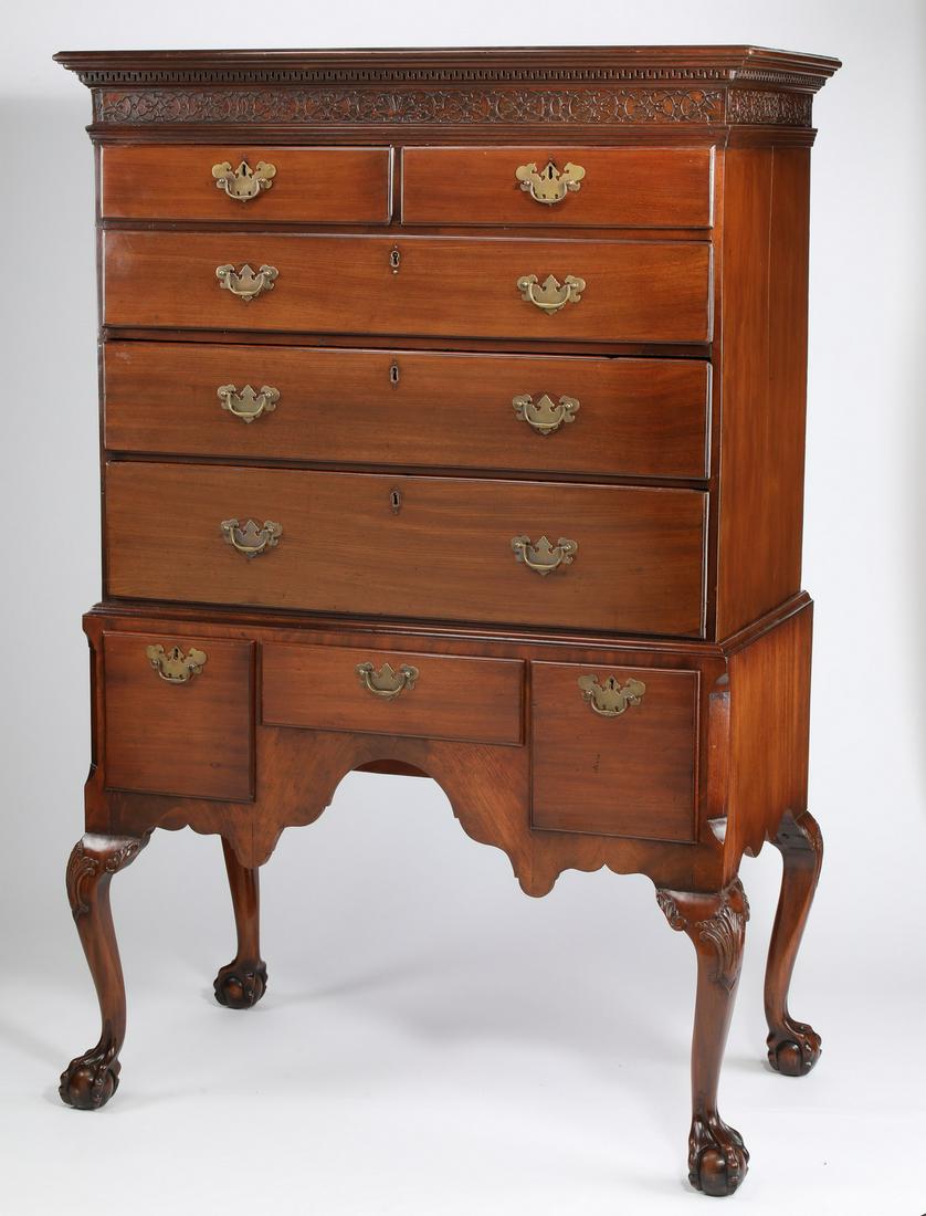 19th c. English Georgian mahogany highboy, 68"h: English Georgian mahogany highboy, mid-19th century, having a rectangular top over a carved fretwork continuous frieze, surmounting two drawers over three drawers over three drawers, above a shaped ap