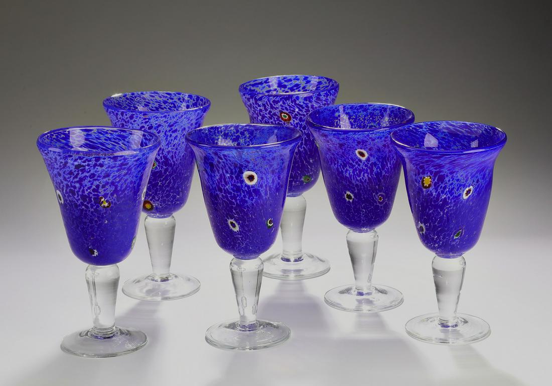 (6) Modern hand-formed art glass water glasses: Group of (6) hand-formed cobalt art glass water glasses, each executed in cobalt blue bubble glass with a spotted design, having no visible marks, 7.5"h x 4.25"dia.