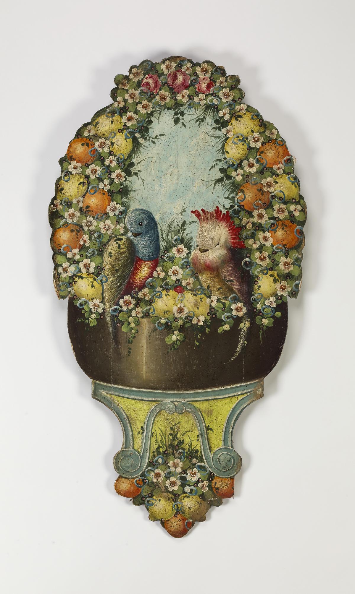 Early 20th c tromp l'oeil embellished print on panel: Early 20th century tromp l'oeil hand-embellished print on panel, depicting a lavish bouquet of roses, jasmine blossoms, oranges, and lemons, centering two birds of paradise perched on a bowl, surmount