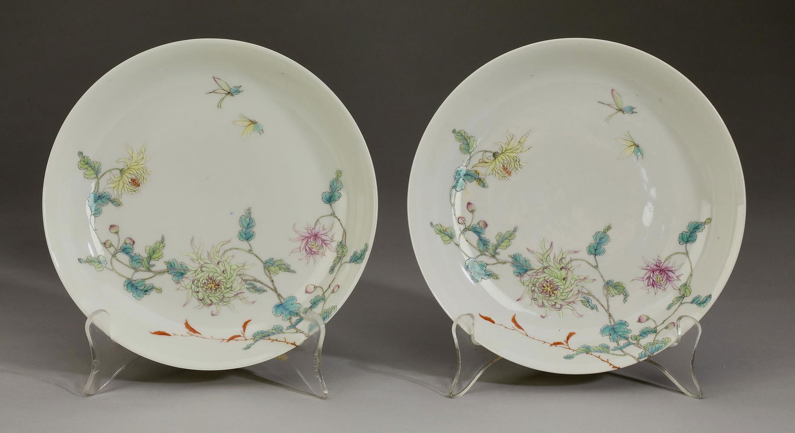 (2) Chinese famille rose 'All In Abundance' low bowls: Pair of Chinese famille rose low bowls, the interiors decorated with butterflies, chrysanthemums, and maple leaves expressing "All in Abundance" and representing the autumn, 1.5"h x 7.5"dia.