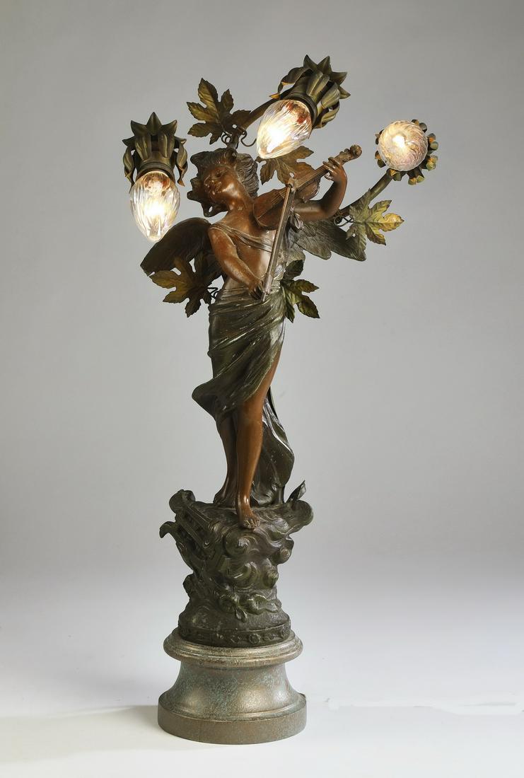 French Art Nouveau style figural 3-light table lamp: French Art Nouveau 3-light figural newel post style table lamp in the manner of Louis Moreau (French, 1855-1919), circa 1915, executed in polychrome metal, depicting a classically draped maiden playin