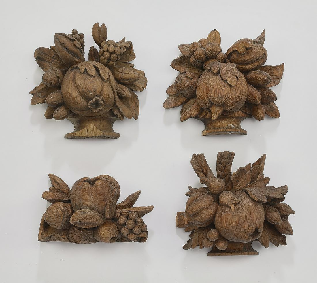 (4) Continental carved fruit decorative elements: Group of (4) Continental carved decorative elements, each in the form of various fruit arrangements, including (1) measuring 4.25"h x 4.25"w x 2"d, (1) measuring 4"h x 4.5"w x 2"d, (1) measuring 2.5"h