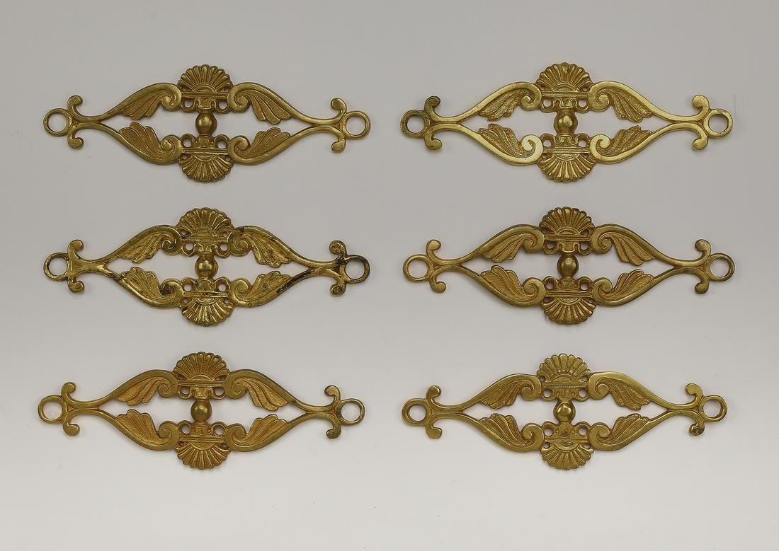 (6) Italian gilt bronze scallop decorative appliques: Group of (6) Italian gilt bronze decorative appliques, each of pierced scallop and scrollwork form, 2"h x 5.75"w x 0.25"d.