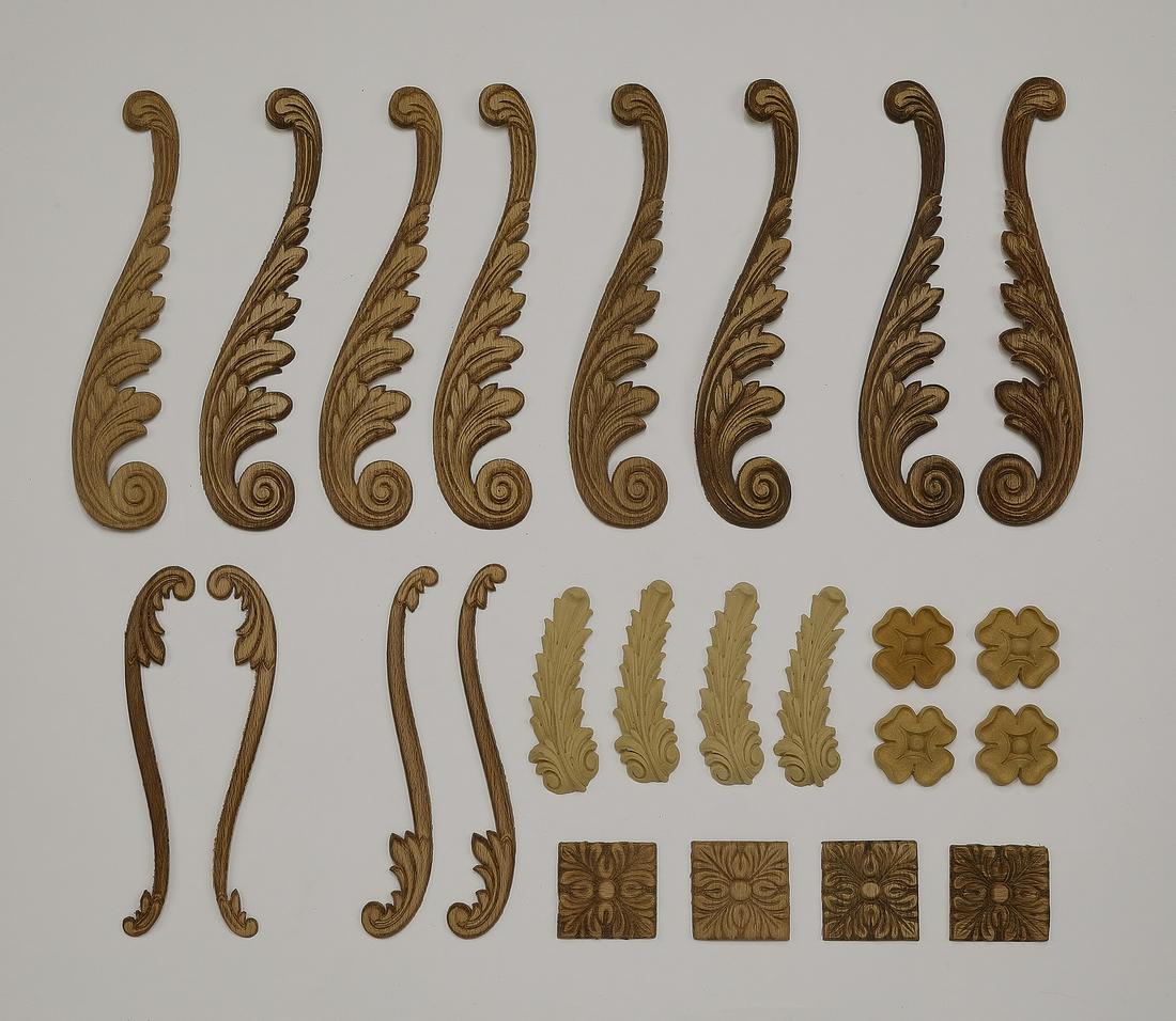 (24) Continental decorative appliques: Group of (24) Continental decorative appliques, including (8) of acanthus scrollwork form, measuring 9.75"h x 2"w, (4) of scrollwork form, measuring 8"h x 1.5"w, (4) of acanthus leaf form, measuring 4