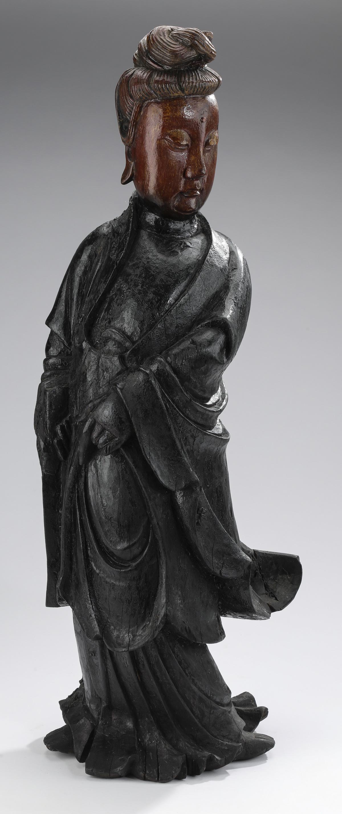 Carved and paint decorated Guanyin, 28"h: Carved wood and polychrome paint decorated Guanyin, depicting a standing Guanyin in a traditional pose, 28"h x 11"w x 7.5"d.