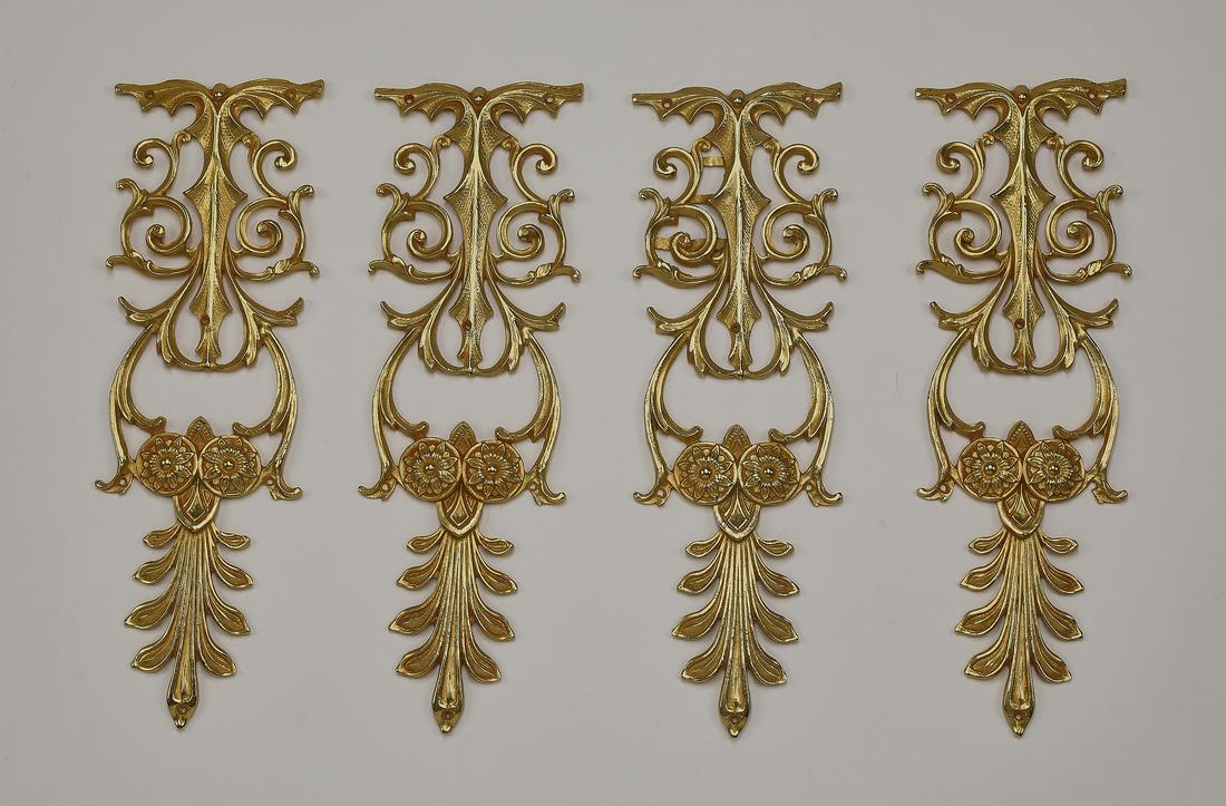 (4) Italian gilt bronze decorative appliques, 13"h: Group of (4) Italian gilt bronze decorative appliques, each having pierced scrollwork rising on rosettes and acanthus leaves, 12.75"h x 4.25"w x 0.5"d.