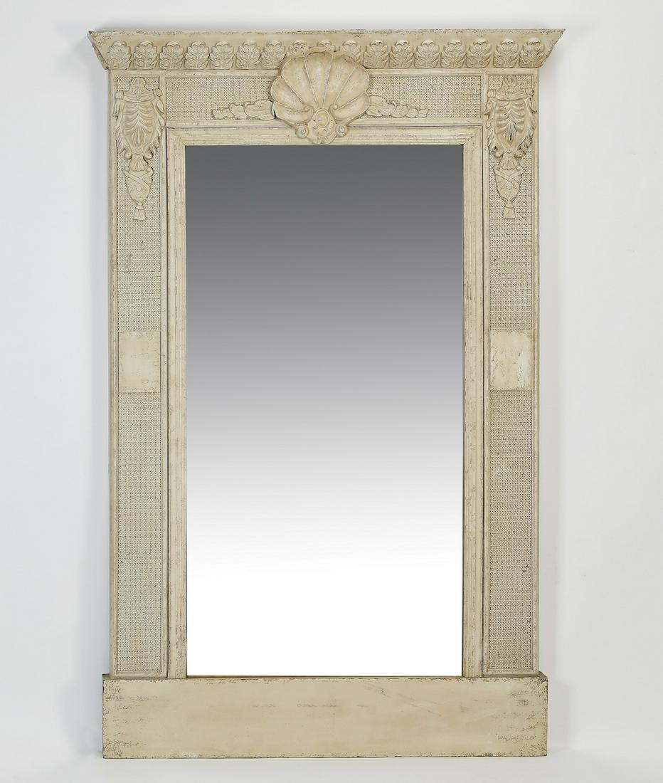 Rococo style wall mirror, 71"h: Rococo style wall mirror, executed in cast composition, having an acanthus leaf-decorated plinth cornice over a scallop cartouche centering the rectangular glass, 71"h x 46.5"w x 4"d.