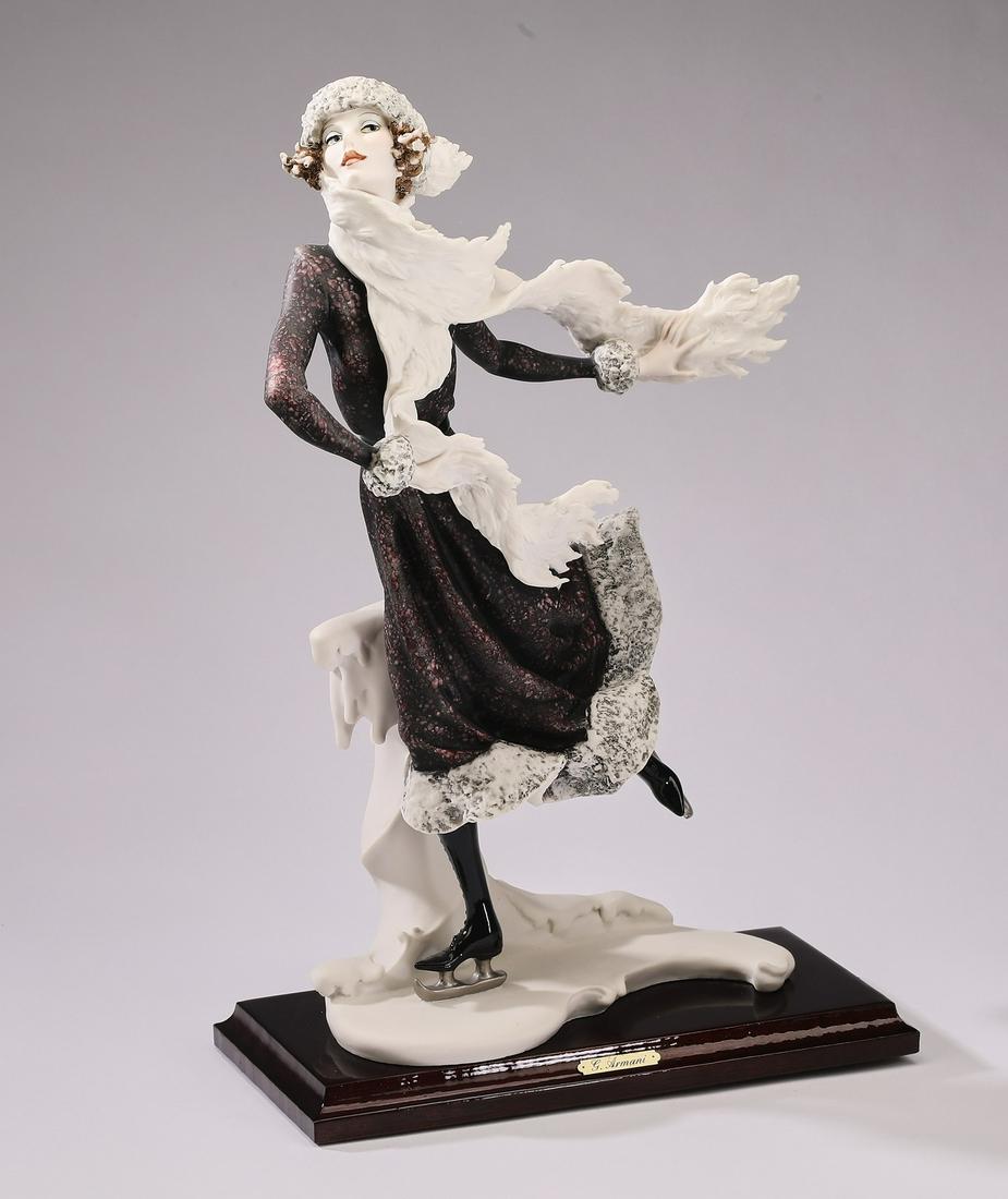 Giuseppe Armani art sculpture, 'Skater - Winter': Giuseppe Armani art sculpture, 'Skater - Winter,' 1989, depicting a young lady in a purple fur lined coat gliding across the ice, maker marked and signed, 15.25"h x 9.5"w x 5.5"d.