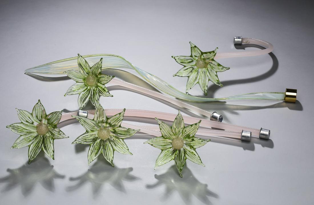 (6) Italian Murano hand-formed glass flowers: Group of (6) Italian Murano glass accents, each hand-formed with apple green blossoms and twists, including (2) measuring 12"h x 4.75"dia, (1) 9.75"h x 4.25"dia, (1) 10"h x 4.25"dia, (1) 18"h x 4.25"d