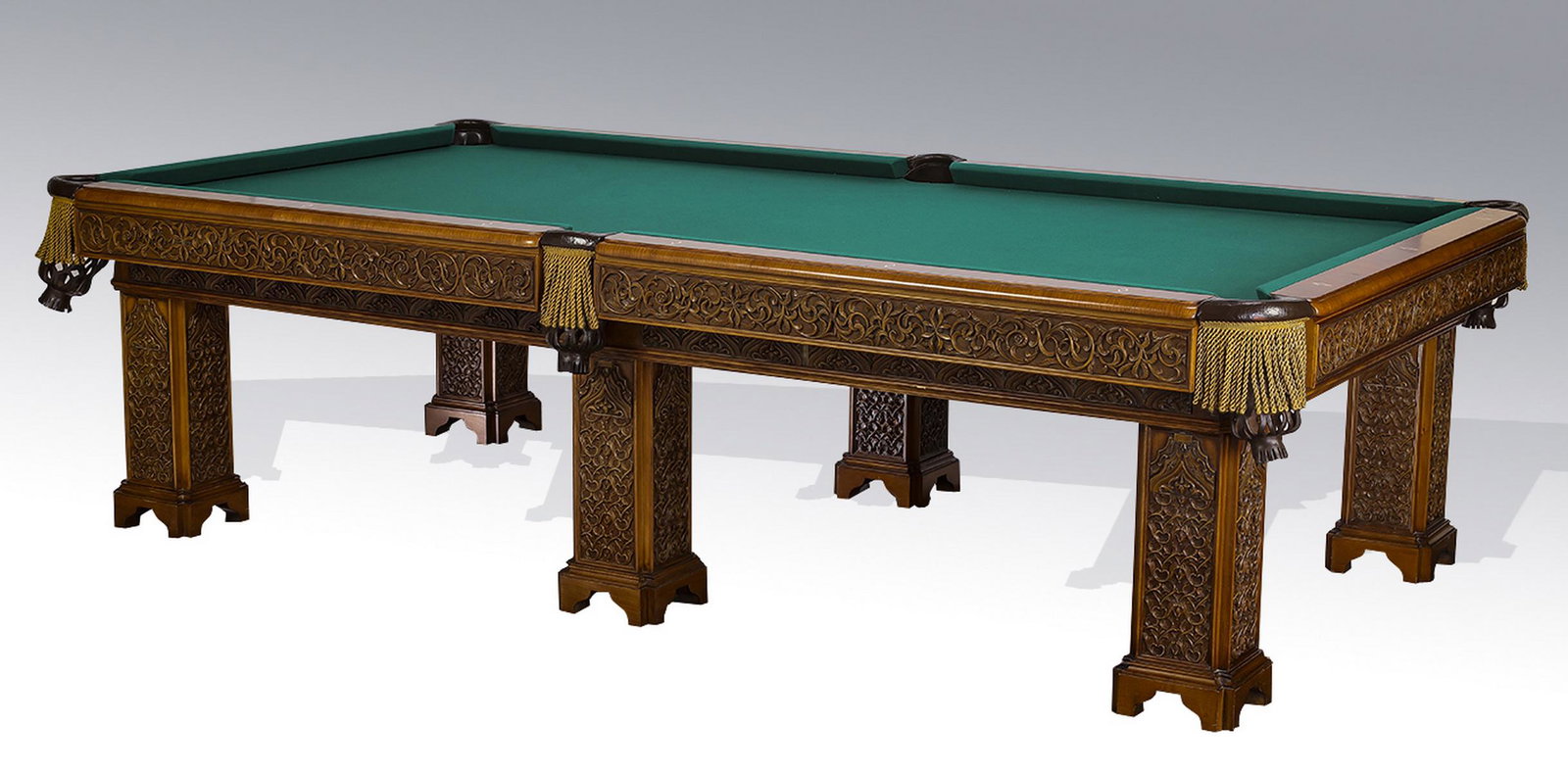 Custom crafted Renaissance Revival pool table: Custom crafted Italian Renaissance Revival mahogany and burl wood pool table, having a green felt playing surface, above a wide apron of carved foliate rinceau and curved arches, the whole rising on s