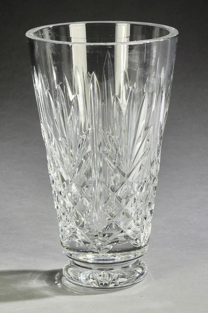 Waterford crystal vase, maker marked: Waterford crystal vase, of tapering form, the body cut in the round with fans and geometric forms, maker marked, 8.25"h x 4.75"dia.