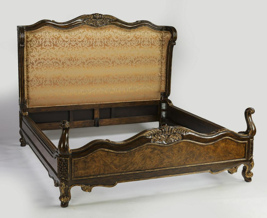 Marge Carson king size upholstered burl wood bed: Elaborate Marge Carson king size burl wood bed in the Louis XV taste, the headboard having a serpentine shaped crest flanked by small wings, centering a parcel gilt cartouche, upholstered in damask fa