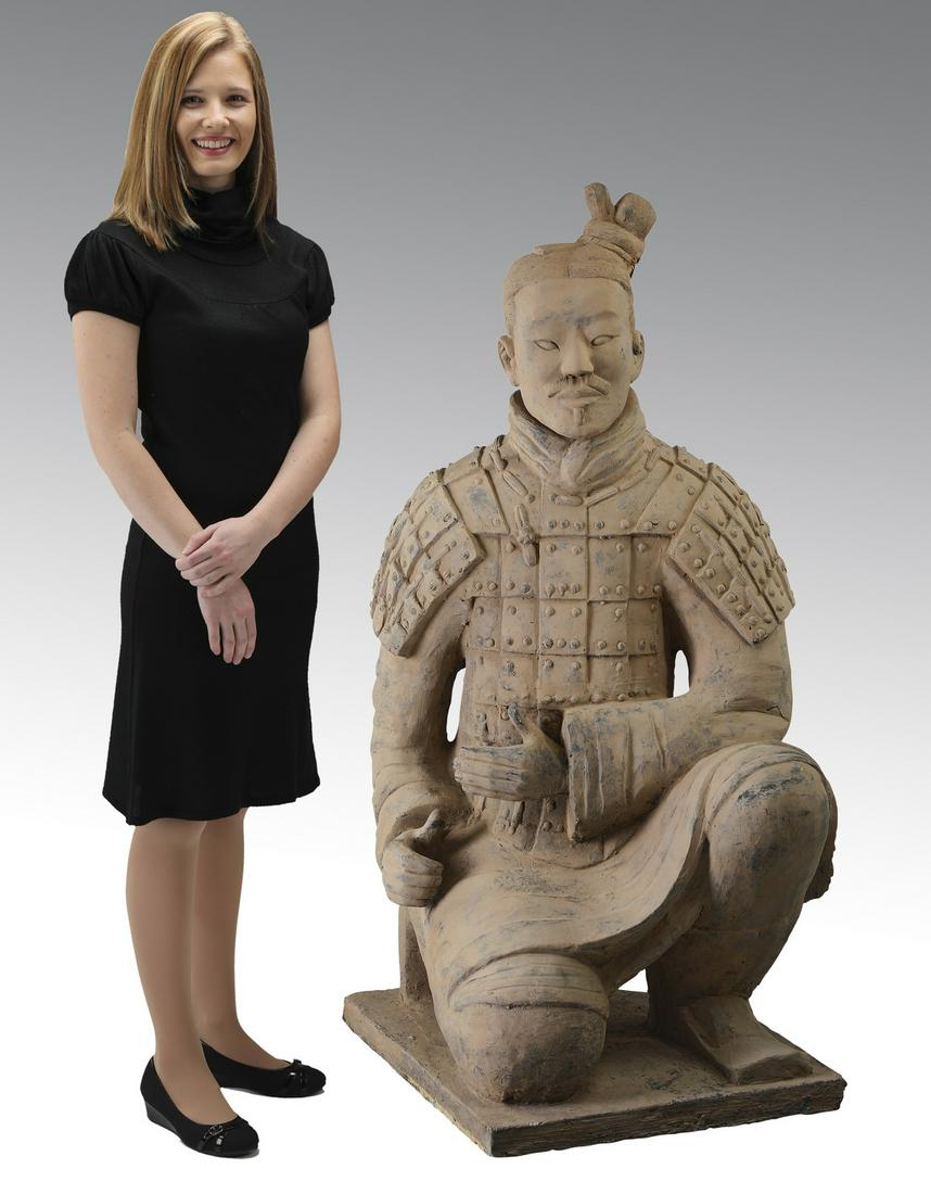 Stone replica of a terracotta kneeling archer: Chinese stone replica of a terracotta kneeling archer, after the original from the mausoleum of Emperor Qin Shihuang, circa 221-206 BC, the archer is depicted wearing tessellated shoulder and body arm