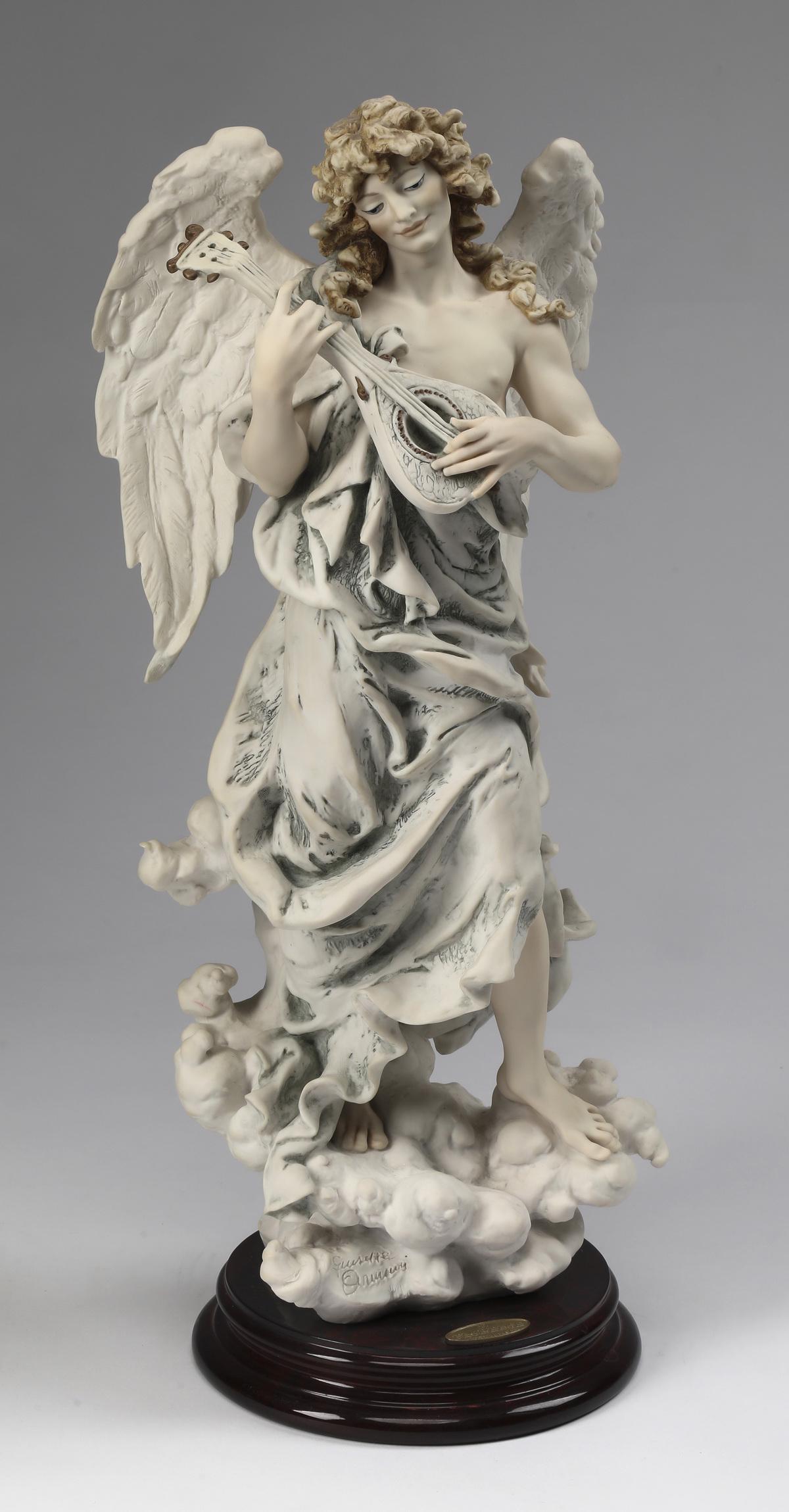 Giuseppe Armani limited edition sculpture of Gabriel: Giuseppe Armani limited edition art sculpture, 'Gabriel,' executed in composition material with hand painted detail, depicting the winged archangel playing a mandolin while treading through clouds, ha