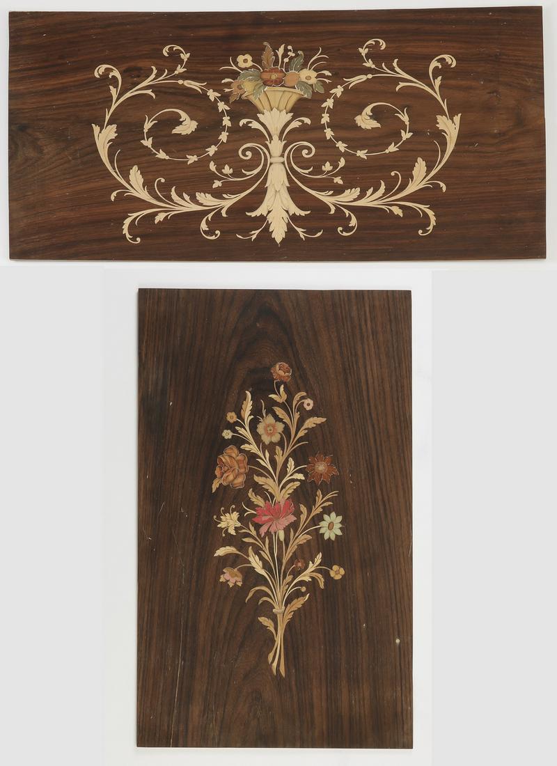 (2) Italian polychrome marquetry panels, 14" & 24": Two Italian polychrome marquetry panels in the Rococo taste, each centering an urn of flowers above acanthus scrollwork on a dark figured ground, 13.5"h x 25"w; the second depicting a floral spray aga