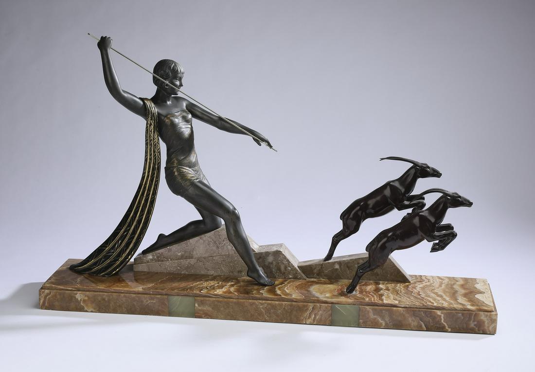 After J. Dauvergne 'Diana The Huntress' bronze, 33"w: After J. Dauvergne (French, 20th Century) bronze, titled 'Diana The Huntress,' depicting the Roman goddess striding forward with a spear aimed at a pair of gazelles, rising on a marble base marked 'J.