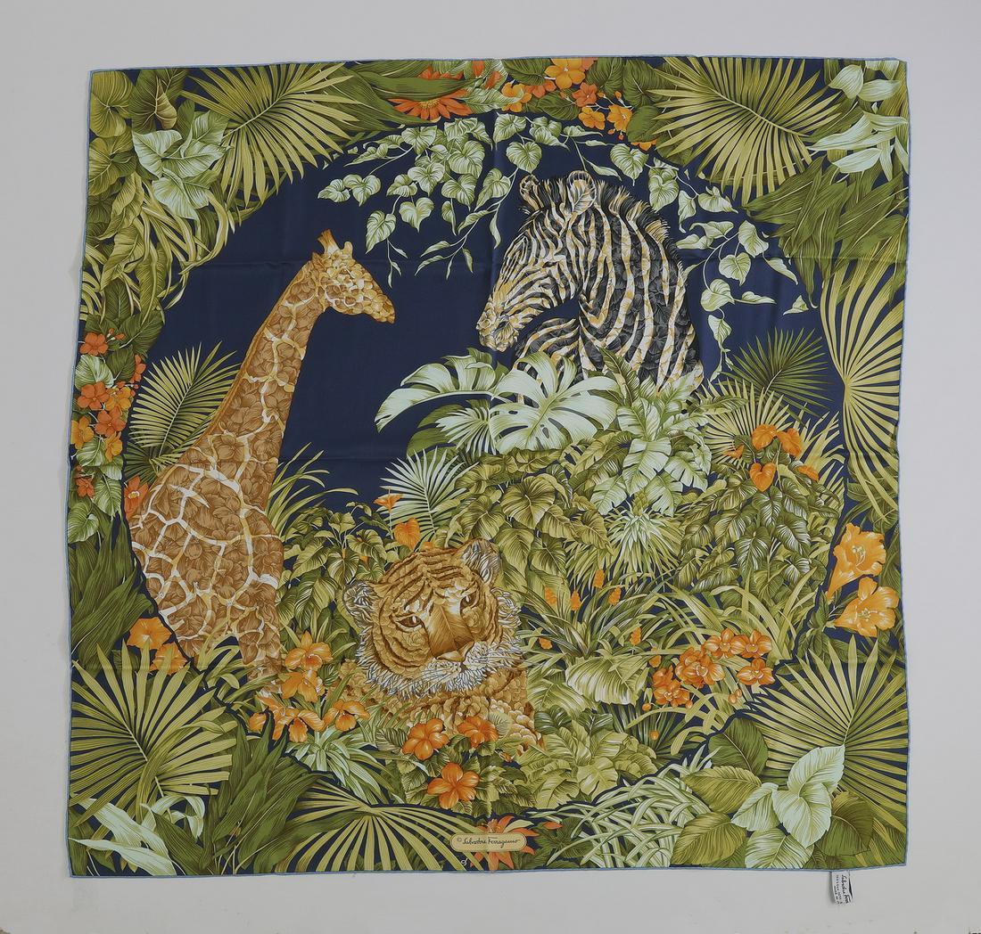 Ferragamo Italian silk scarf w/ box, 34.5"sq: Ferragamo Italian silk scarf, centering a reserve depicting a tiger, a zebra, and a giraffe framed by lush foliage in green tones on a navy ground, having the Ferragamo signature at center bottom and