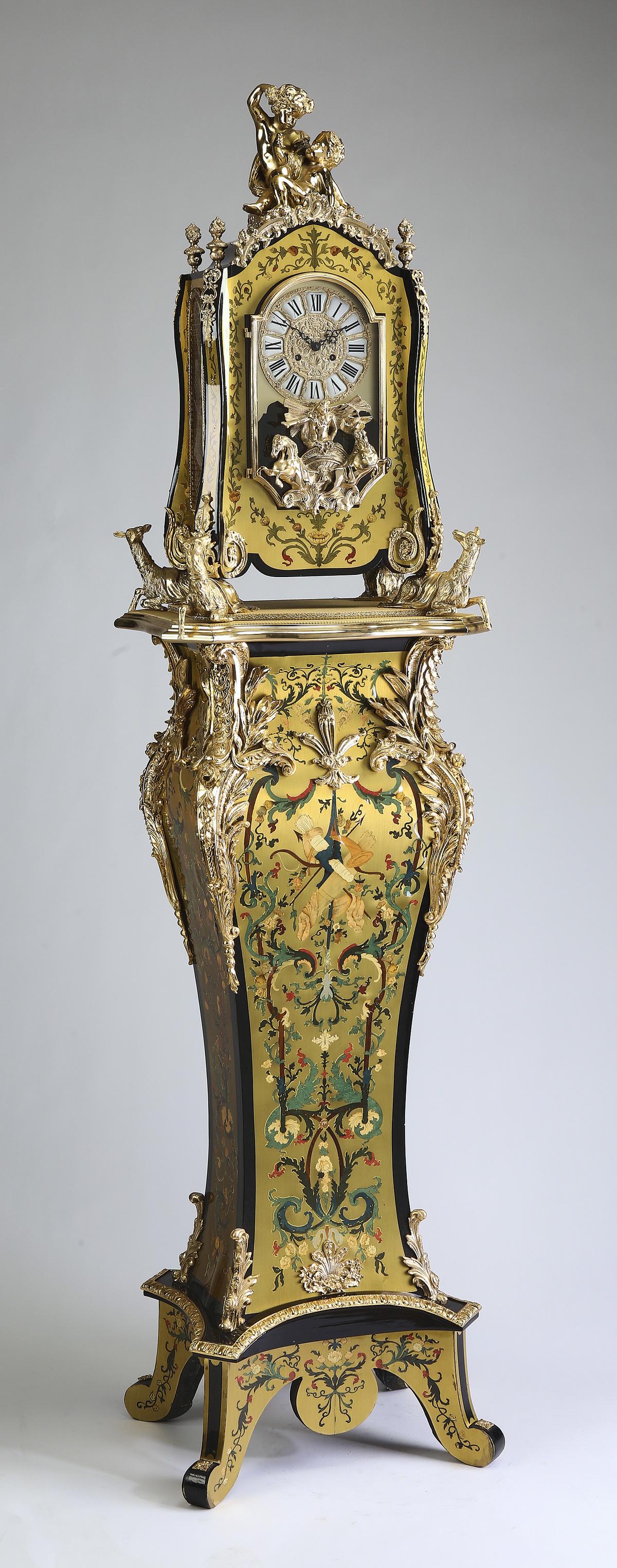 Louis XIV style polychrome boulle clock by Hermle: Louis XIV style polychrome boulle and gilt mounted clock on pedestal by Franz Hermle, in the manner of the Augustus III clock by Jean-Pierre Latz, having a gilt finial depicting frolicking putti, abov