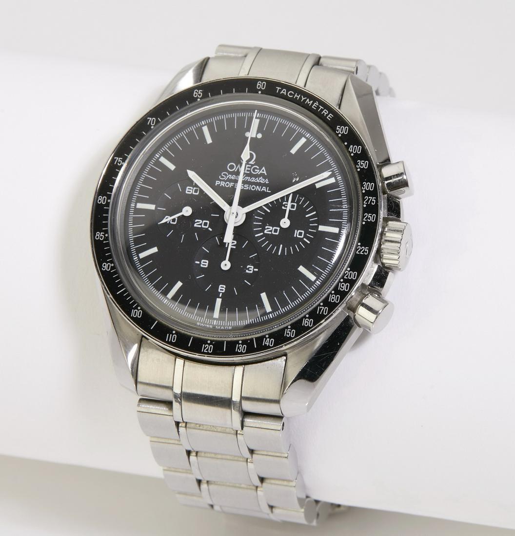Omega 42mm Speedmaster Professional : Omega 42mm Speedmaster Professional stainless steel watch, having a black dial with stick markers, a seconds sub-dial, a 30-minute recorder, a 12-hour recorder, and a central chronograph hand, all co