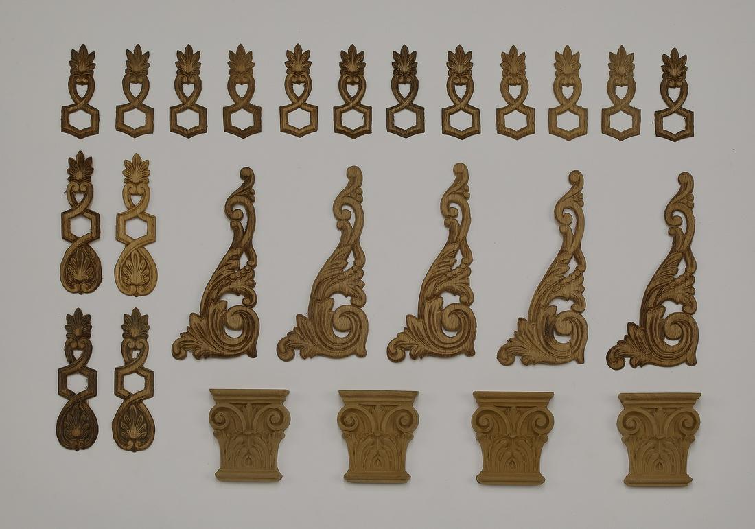 (25) Continental decorative appliques: Group of (25) Continental decorative appliques, including (12) appliques measuring 3"h x 1"w, (4) pierced appliques measuring 4.75"h x 1.25"d, (5) pierced acanthus appliques measuring 6.5"h x 2.75"d, 