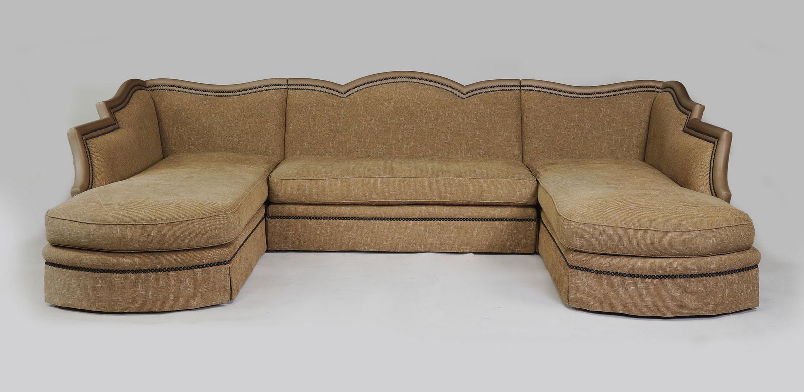 Marge Carson (3) pc sectional sofa with down cushions: Marge Carson (3) pcs saffron textured velvet and leather trim sectional sofa, having a scalloped crest rail covered in leather with a double row of nailhead trim, stepping down and ending in a chaise