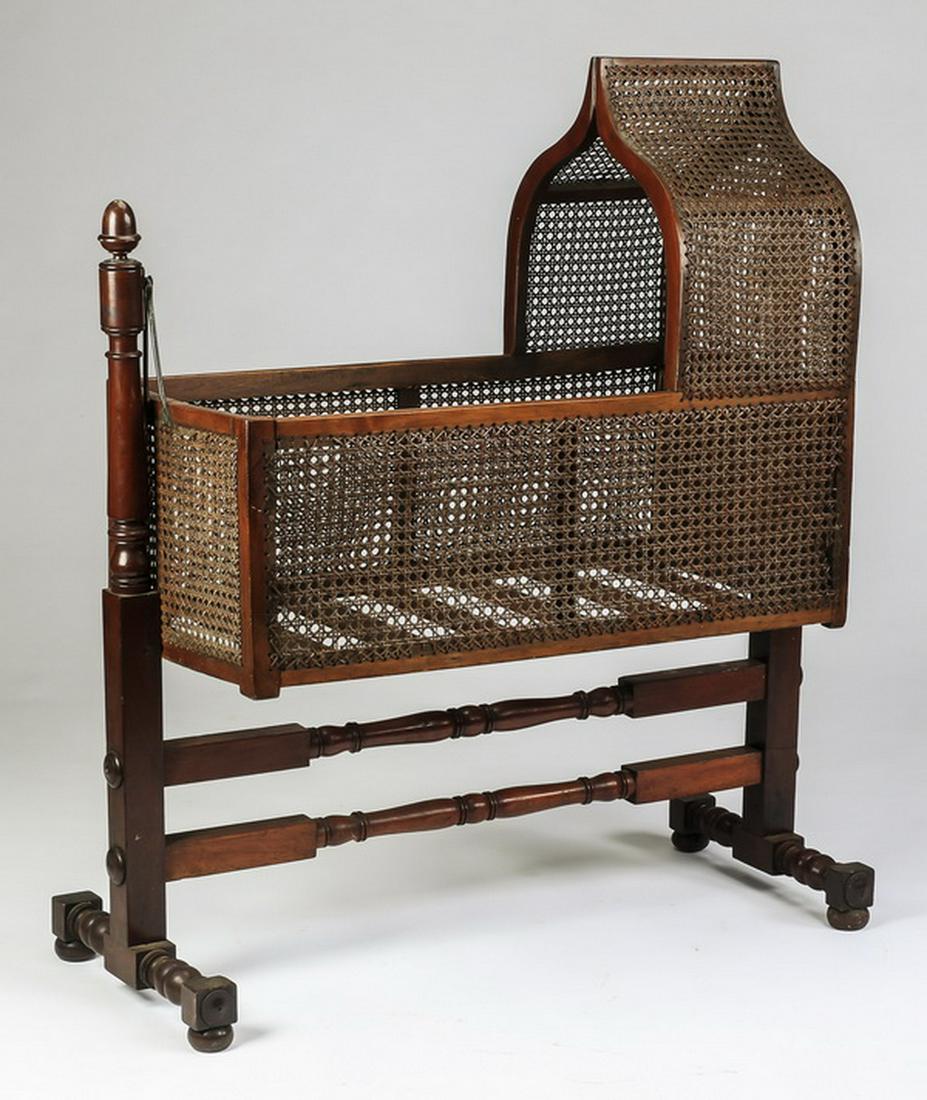 Early 20th c. swinging cradle in woven cane, 47"h (1 of 1)