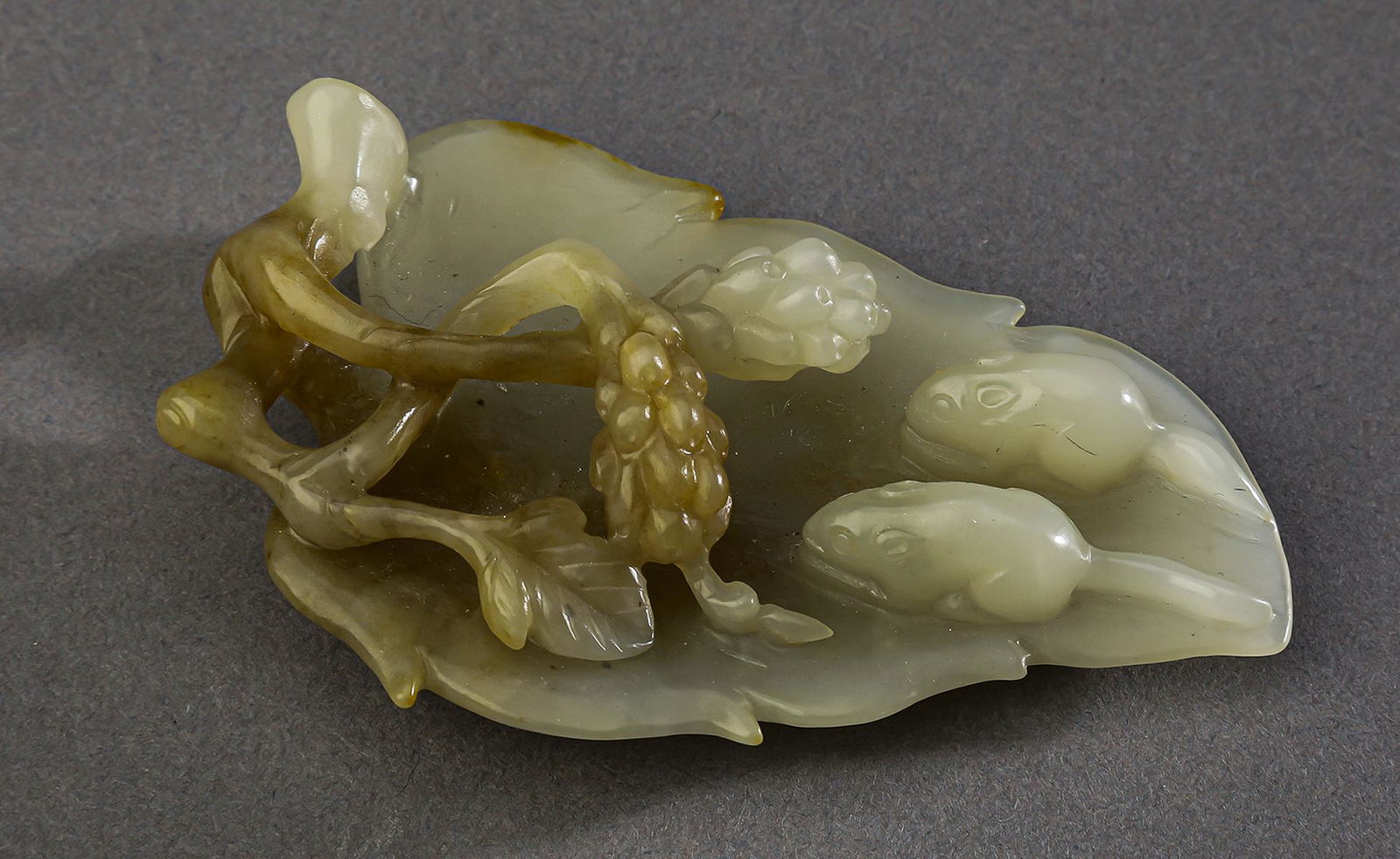 Chinese celadon jade carving of grape leaf, 3"l (1 of 4)