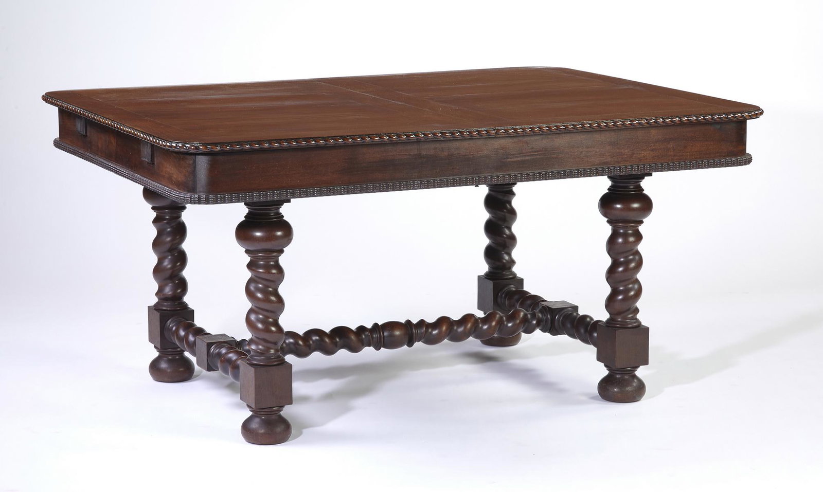 Early 20th c. Portuguese rosewood table w/ leaves: Portuguese rosewood banquet table in the Baroque taste, early 20th century, having a flush paneled top with rounded corners, rising on barley twist legs joined by an H-shaped stretcher terminating to 