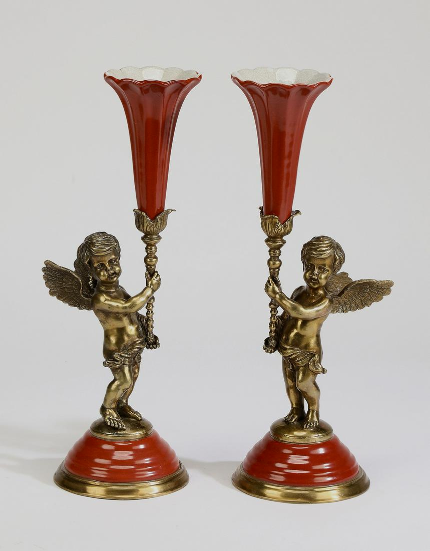 (2) Porcelain and brass figural putto vases (1 of 5)