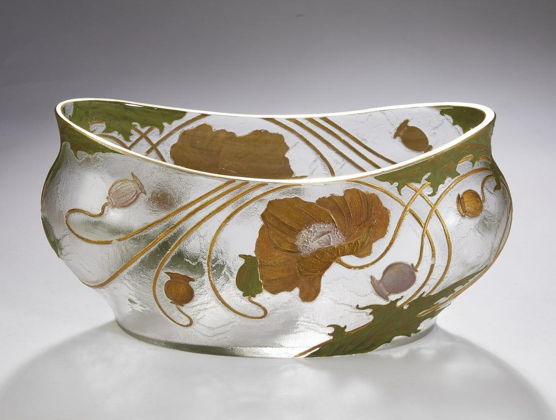 Art Nouveau enameled poppy vase: Art Nouveau enameled and molded poppy vase attributed to Val St. Lambert, of oval bombe form, executed in clear glass with enamel and gilt decoration, having a gilt rim over a body ornamented with lar