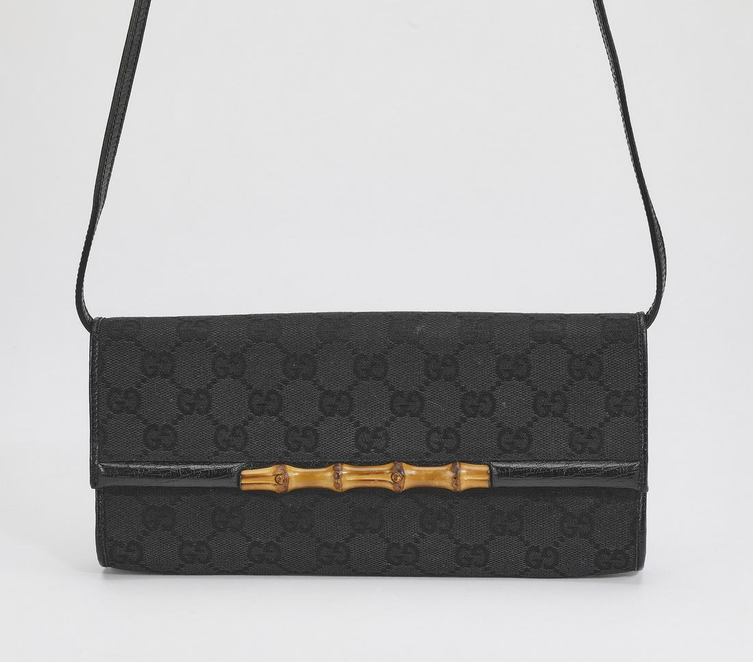Authentic Gucci Monogram Canvas Sling Bamboo Clutch (1 of 6)