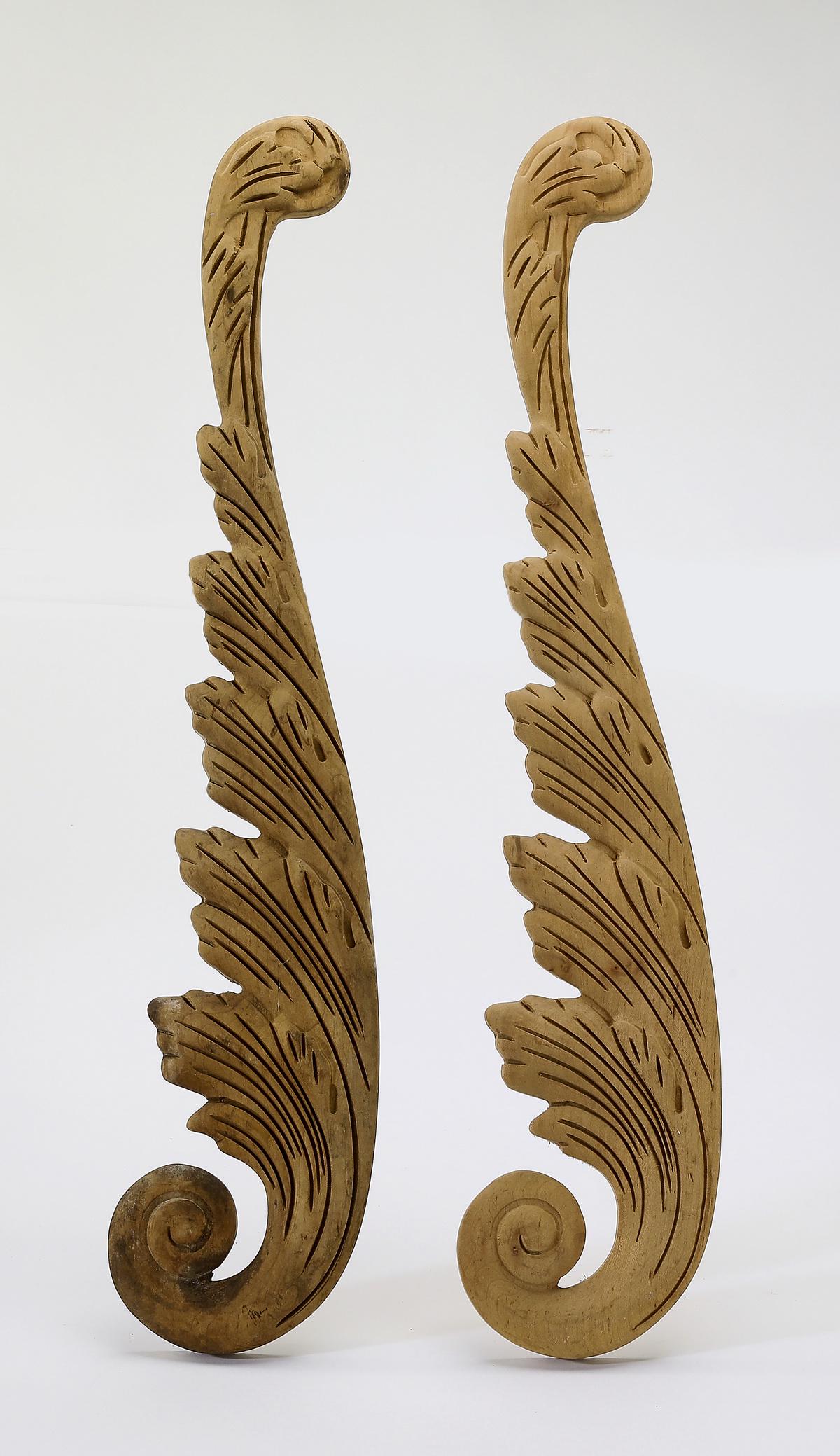 (2) Carved acanthus scroll architectural appliques: Pair of carved architectural appliques, each of acanthus scroll form with relief carved detailing, ready for your stained or painted finish, 24"h x 5"w x 1"d.