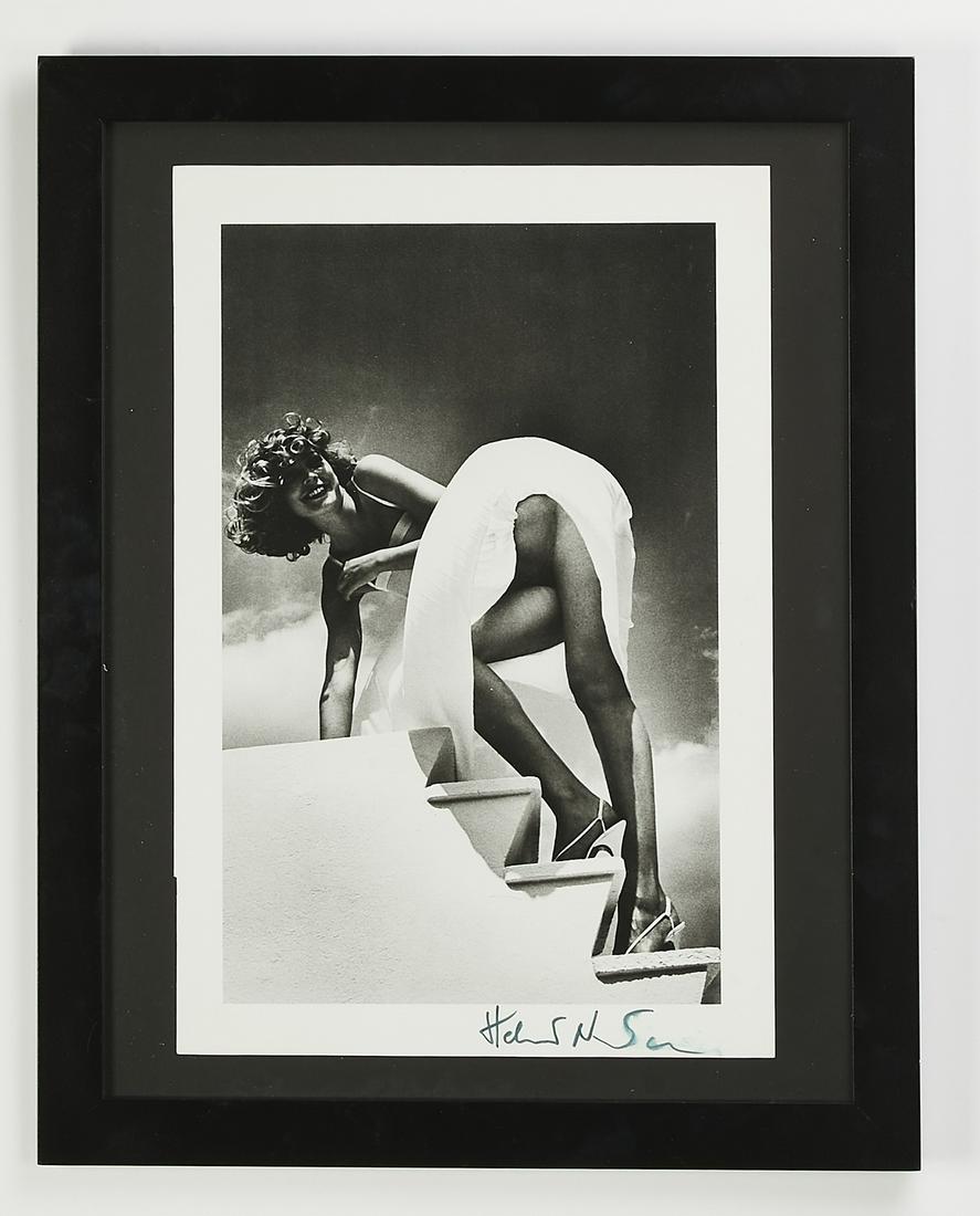 H. Newton photo print 'Saint Jean, Cap Ferrat, 1978': Helmut Newton, (German/French 1920-2004), signed photo print, 'Saint Jean, Cap Ferrat, 1978,' depicting a partially nude beauty wearing a white dress, signed in green marker at lower right, sight 16"h