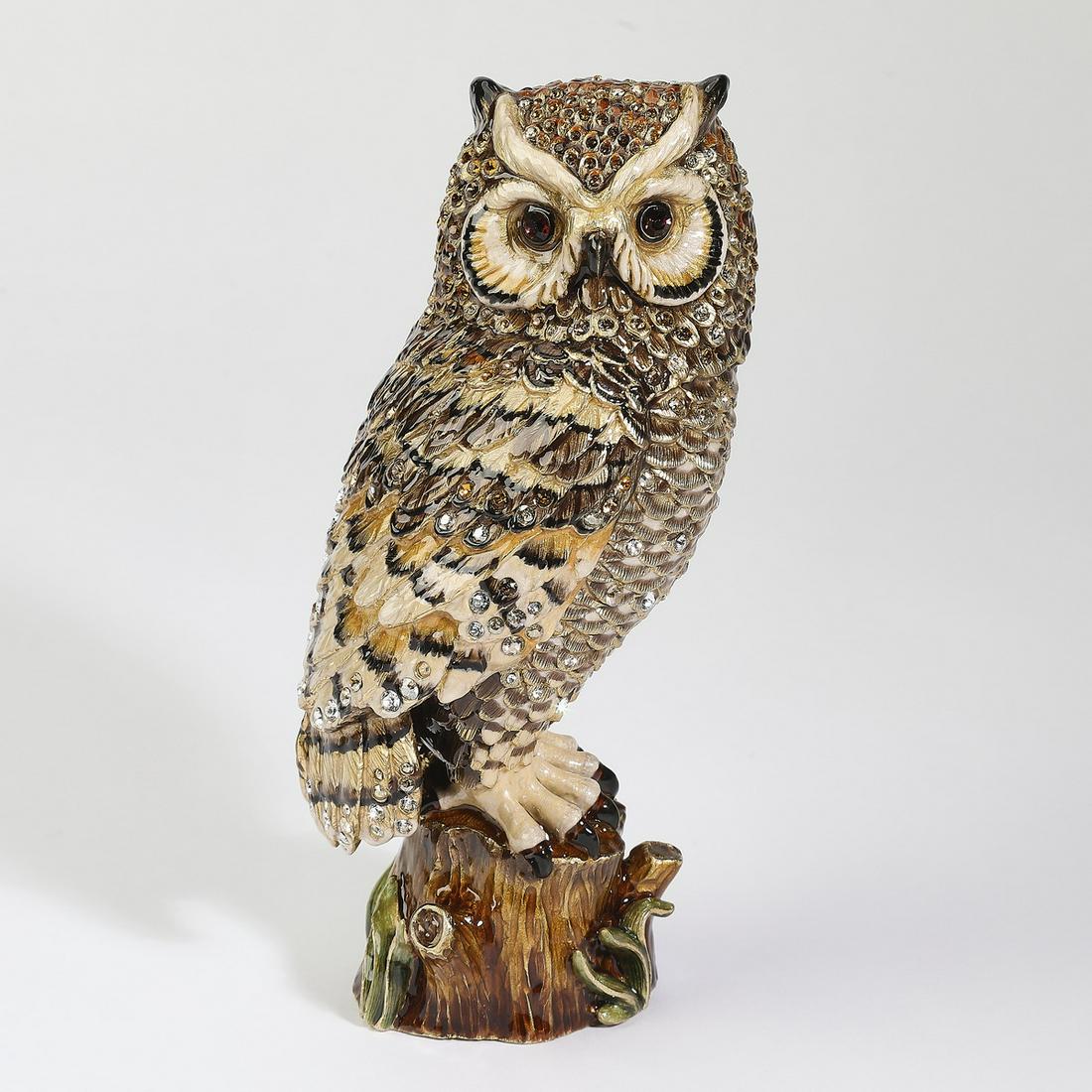 Jay Strongwater and Swarovski owl figure, 7"h: Jay Strongwater owl figure, hand-painted in enamel and accented with Swarovski crystals, depicting the solemn bird perched on a tree stump, with maker's mark to underside, 6.75"h x 3.25"w x 3"d.