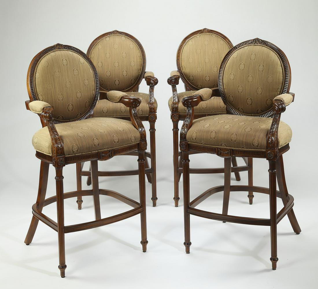 (5) Hancock and Moore mahogany barstools: (5) Hancock and Moore mahogany bar stools in the Sheraton taste, each having an oval back and a shaped seat flanked by molded arms, rising on fluted tapering legs joined by a box stretcher, terminatin