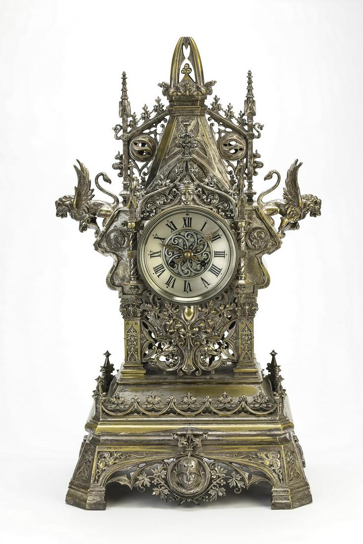 19th c. Continental Gothic Revival double-face clock: Continental Gothic Revival double-face bronze clock, late 19th or early 20th century, having a steeple topped square case comprised of pierced Gothic tracery panels, spires, arches, and buttresses, fl