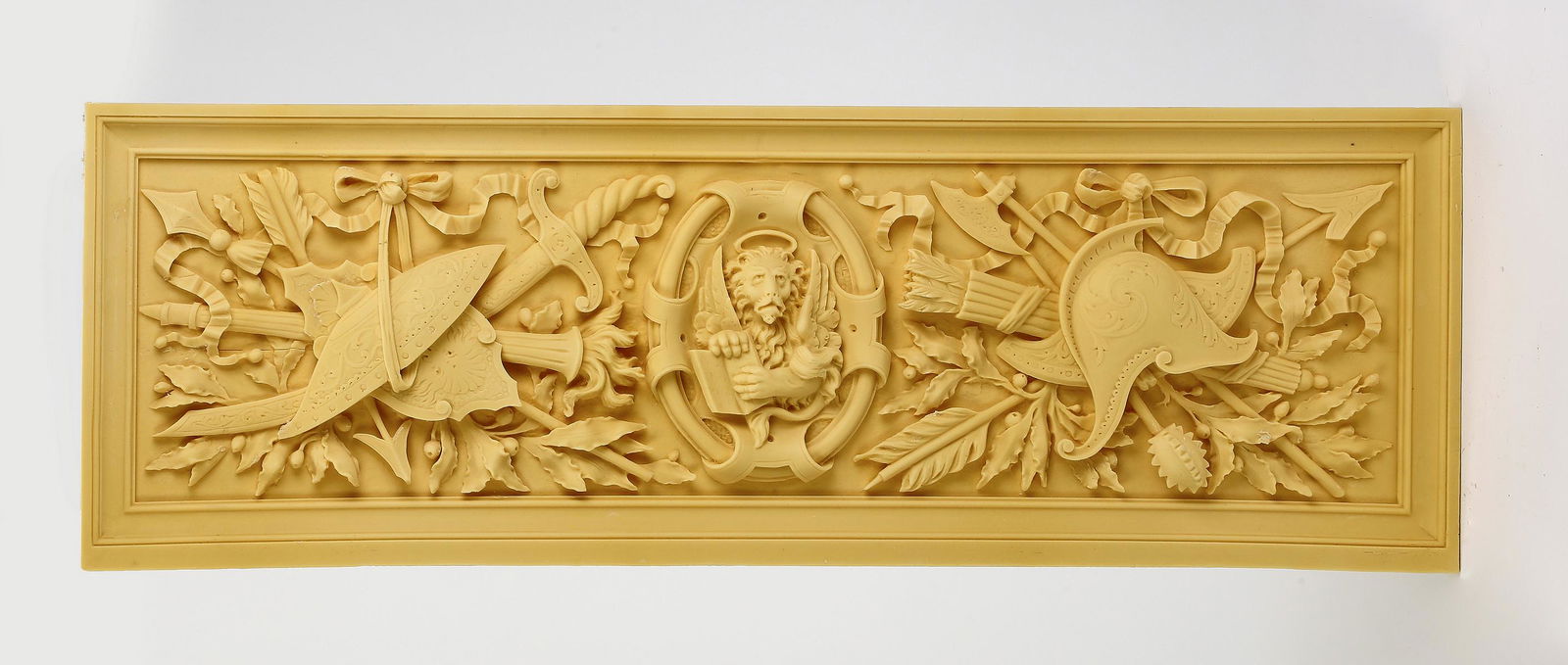 Lion of Saint Mark architectural panel, 41"w: Lion of Saint Mark architectural panel, crafted of cast composition, depicting the winged lion gesturing to the scripture centered by crossed armor accented with ribbons, ready for your stained or pai