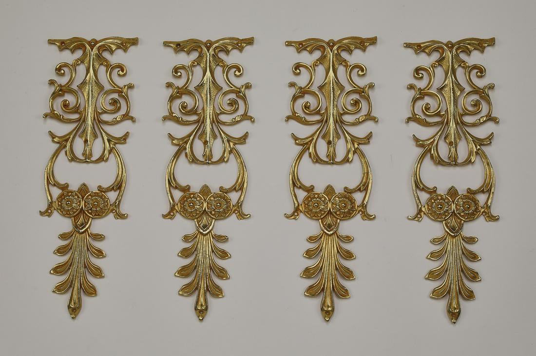 (4) Italian gilt bronze decorative appliques, 13"h: Group of (4) Italian gilt bronze decorative appliques, each having pierced scrollwork rising on rosettes and acanthus leaves, 12.75"h x 4.25"w x 0.5"d.