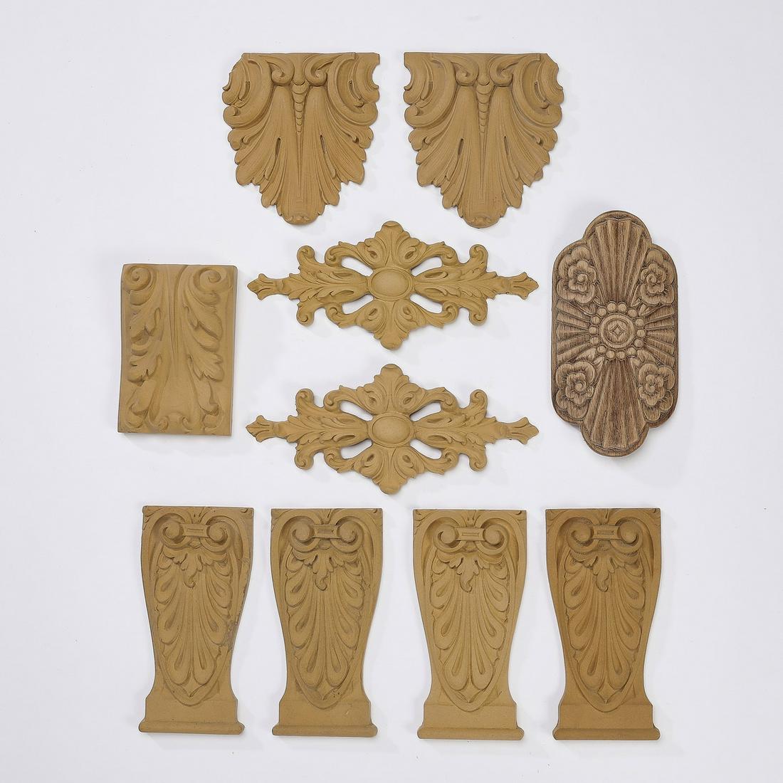 (10) Continental carved wood appliques: Group of (10) carved wood appliques, each ready for your own stained or painted finish, including (2) of acanthus leaf medallion form, 5"h x 4.5"w x 0.5"d, (2) of acanthus leaf form, 4.75"h x 3.25"w x