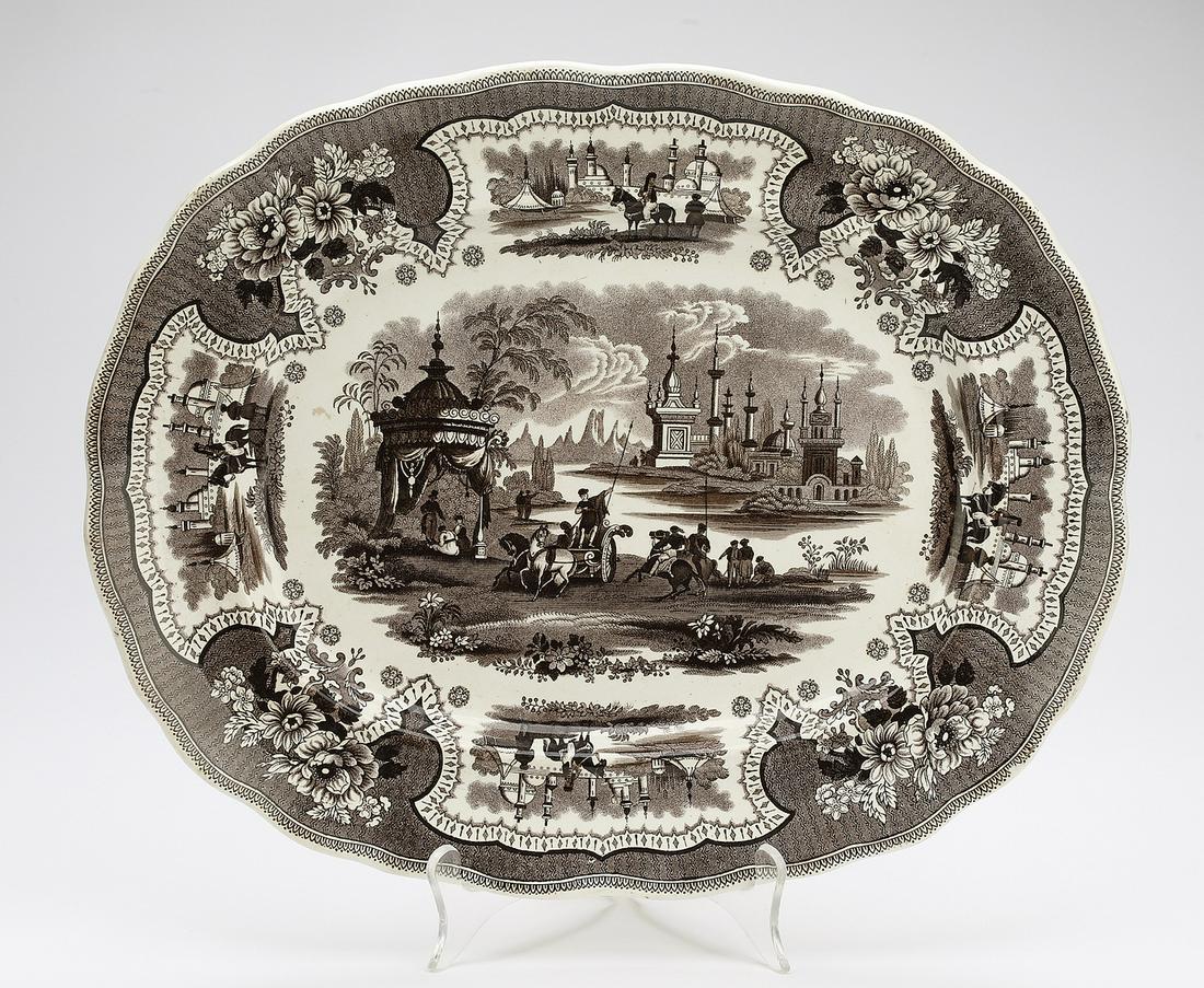19th c. Adams 'Palestine' platter, marked: Adams chocolate transferware platter in the 'Palestine' pattern, mid-19th century, depicting a domed tent set amidst an exotic landscape, maker marked, 15"l x 12"d.