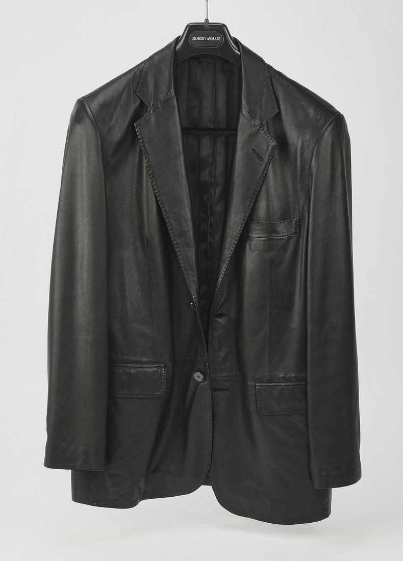 Roberto Rusanni single breasted leather jacket: Roberto Rusanni single breasted cattleman jacket, of black leather, with two buttons and horizontal pockets with flaps, having one centered back vent with a maker label and label for Gene Hiller, 33.5