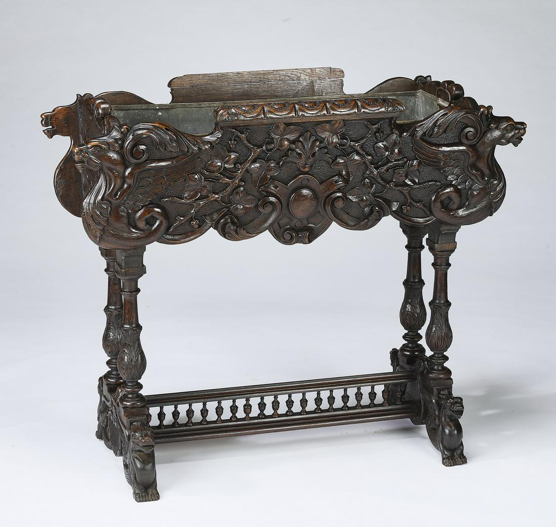 Late 19th c French Renaissance Revival oak jardiniere: French Renaissance Revival oak jardiniere, late 19th century, having an upper planter carved with gryphons and acanthus scrollwork, centering a galvanized metal liner, rising on turned legs terminatin