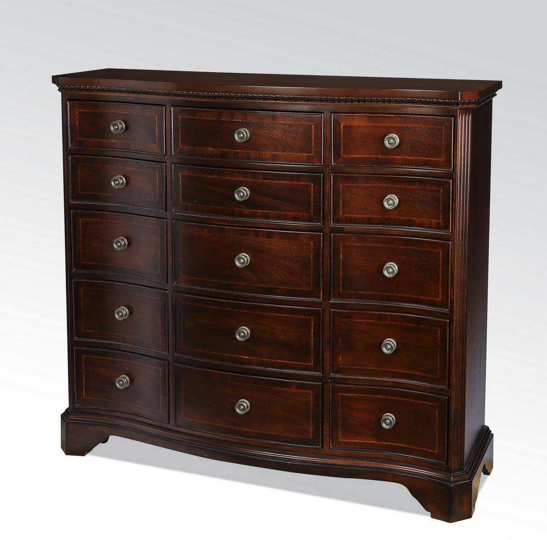 Tall chest with 15 drawers, 54"h: Tall chest of drawers, having a serpentine top over a conforming cabinet fitted with 15 string inlaid drawers, the whole rising on bracket feet, 54.25"h x 60"w x 19"d.