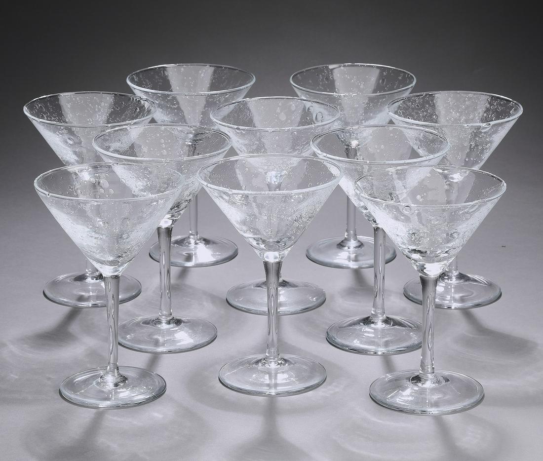 (10) Italian 'Bellini' martini glasses: (10) Italian hand blown clear bubble glass martini glasses, from the Bellini collection by Mariposa, each having a polished pontil mark, 6.25"h x 4.25"dia