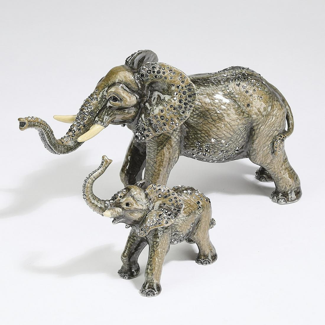 (2) Jay Strongwater and Swarovski elephant figures: Group of (2) Jay Strongwater elephant figures, each hand-painted in enamel and accented with Swarovski crystals, including (1) mature elephant, measuring 4.5"h x 2.75"w x 8.25"d, and (1) young elephan