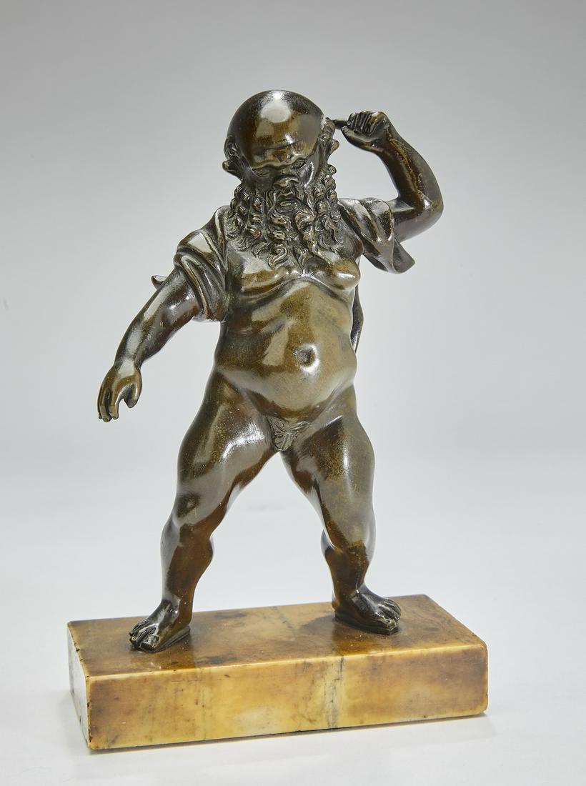 Early 20th c. bronze statuette of Silenus: Bronze statuette of Silenus, early 20th century, the lifelong friend and tutor of the god Bacchus, depicted with a beard and light drapery, the whole resting on a sienna marble base, 6.5"h x 3.25"w; o