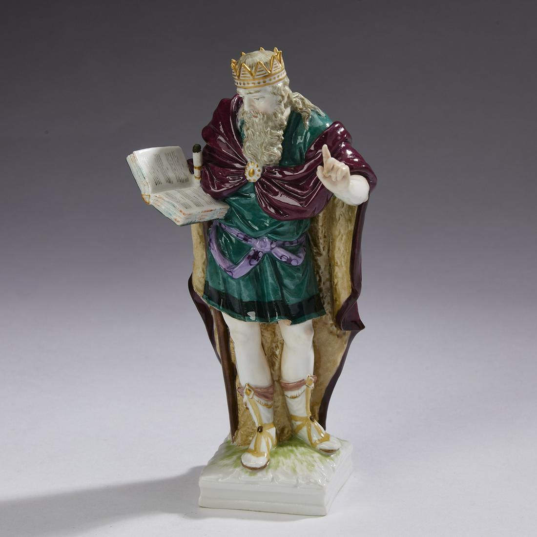 KPM porcelain figure of Rhadamanthus, 19th c.: KPM porcelain figure of Rhadamanthus, late 19th or early 20th century, the son of Zeus and Europa, depicted here as the wise king of Crete wearing a crown and holding a book, the whole resting on a sq