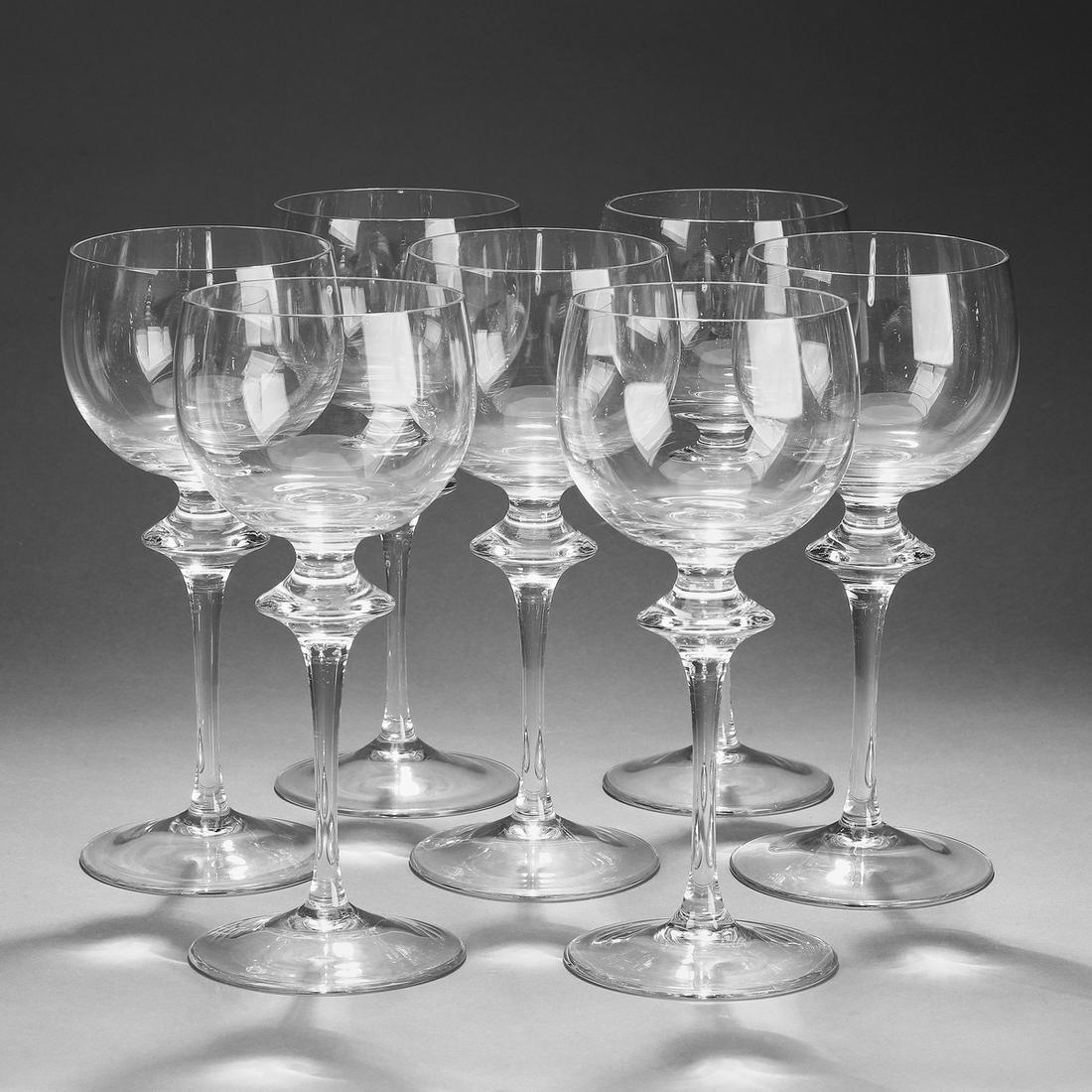 Set of (7) Peill crystal wine glasses: Set of (7) Peill crystal wine glasses, in the manner of Steuben, each having a knop step, maker marked 'P' to underside, 8.75"h x 3.25"dia.